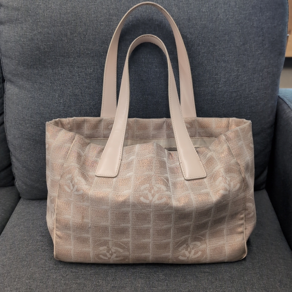 Chanel travel line pink and gold tote